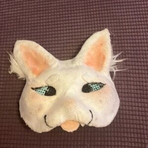 Thearien mask snow leopard
